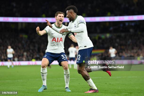 Emerson of Tottenham Hotspur celebrates after scoring the team's first goal with teammate Ben Davies during the Premier League match between...
