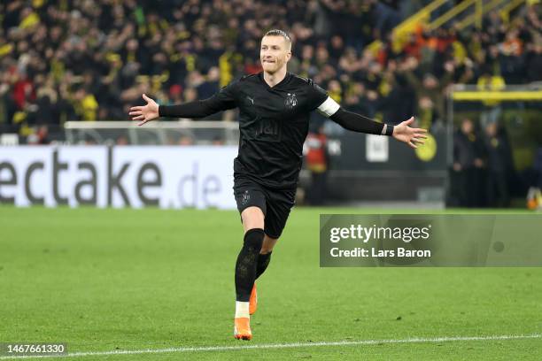 Marco Reus of Borussia Dortmund celebrates after scoring the team's third goal from a free kick during the Bundesliga match between Borussia Dortmund...