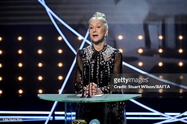 Dame Helen Mirren speaks on stage during the EE BAFTA Film Awards 2023 at The Royal Festival Hall on February 19, 2023 in London, England.