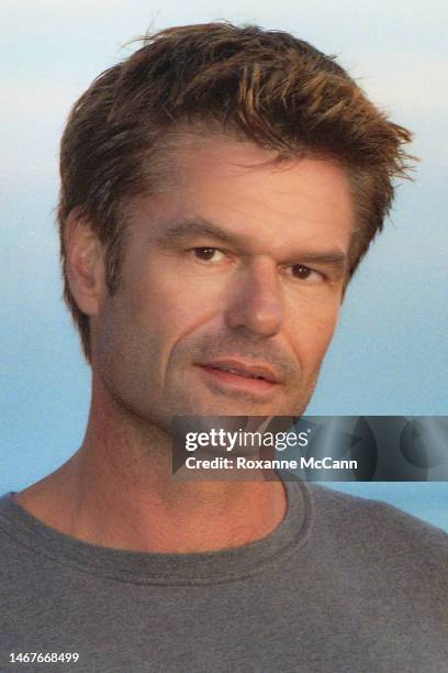 Actor Harry Hamlin enjoys the sunset on the beach in June, 1998 in Malibu, California.