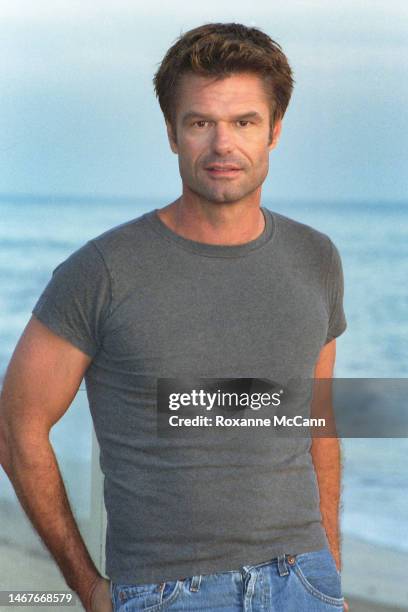 Actor Harry Hamlin enjoys the sunset on the beach in June, 1998 in Malibu, California.