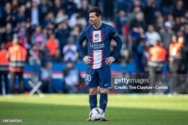 Lionel Messi of Paris Saint-Germain prepares to take his injury time free kick which produced the winning goal during his side's dramatic 4-3 victory...