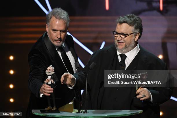 Mark Gustafson and Guillermo del Toro accept the Animated Film Award for 'Guillermo del Toro's Pinocchio' during the 2023 EE BAFTA Film Awards, held...