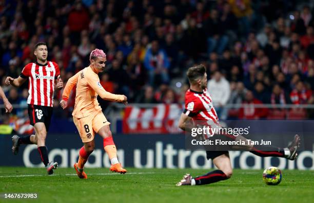 Antoine Griezmann of Atletico Madrid scores the team's first goal during the LaLiga Santander match between Atletico de Madrid and Athletic Club at...
