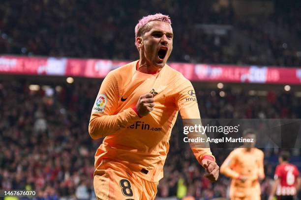 Antoine Griezmann of Atletico de Madrid celebrates after scoring the team's first goal during the LaLiga Santander match between Atletico de Madrid...