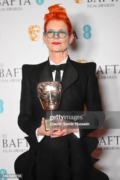 Sandy Powell, winner of the Fellowship Award, poses in the Winners Room during the EE BAFTA Film Awards 2023 at The Royal Festival Hall on February...