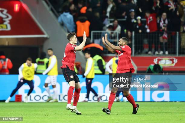 Patrik Schick of Bayer 04 Leverkusen celebrates after scoring the team's second goal with teammate Jonathan Tah during the Bundesliga match between...