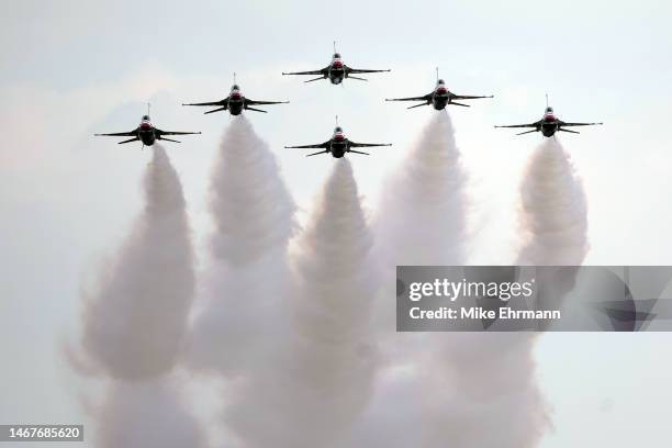 The U.S. Air Force Thunderbirds perform a flyover prior to the NASCAR Cup Series 65th Annual Daytona 500 at Daytona International Speedway on...