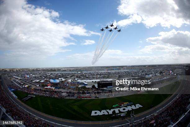 The U.S. Air Force Thunderbirds perform a flyover prior to the NASCAR Cup Series 65th Annual Daytona 500 at Daytona International Speedway on...