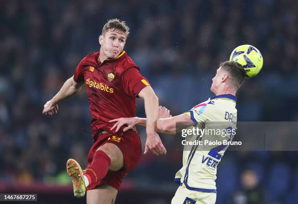 Ola Solbakken of AS Roma contends for the aerial ball with Pawel Dawidowicz of Hellas Verona during the Serie A match between AS Roma and Hellas...