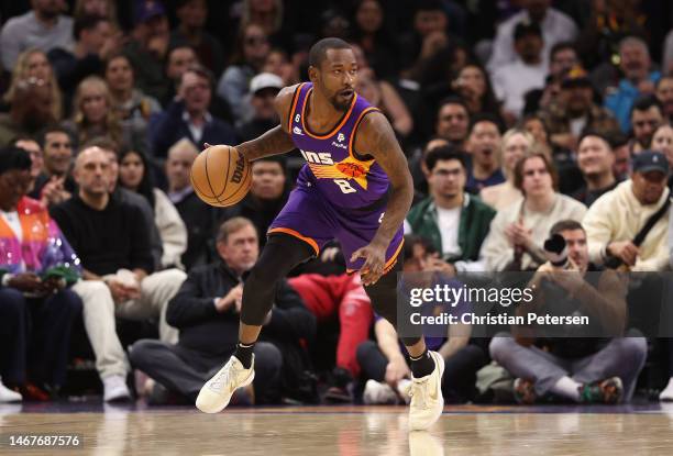 Terrence Ross of the Phoenix Suns handles the ball during the first half of the NBA game at Footprint Center on February 16, 2023 in Phoenix,...