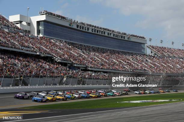 Alex Bowman, driver of the Ally Chevrolet, and Kyle Larson, driver of the HendrickCars.com Chevrolet, lead the field to start the NASCAR Cup Series...