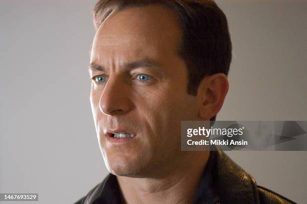 Close-up of English actor Jason Isaacs during the filming of an episode of the cable television series 'Brotherhood,' Providence, Rhode Island,...