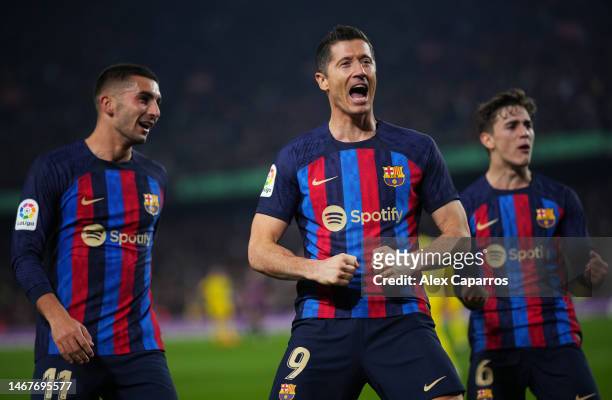 Robert Lewandowski of FC Barcelona celebrates after scoring the team's second goal with teammates during the LaLiga Santander match between FC...