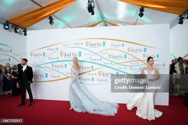 Tatiana Korsakova and Lily James attend the EE BAFTA Film Awards 2023 at The Royal Festival Hall on February 19, 2023 in London, England.