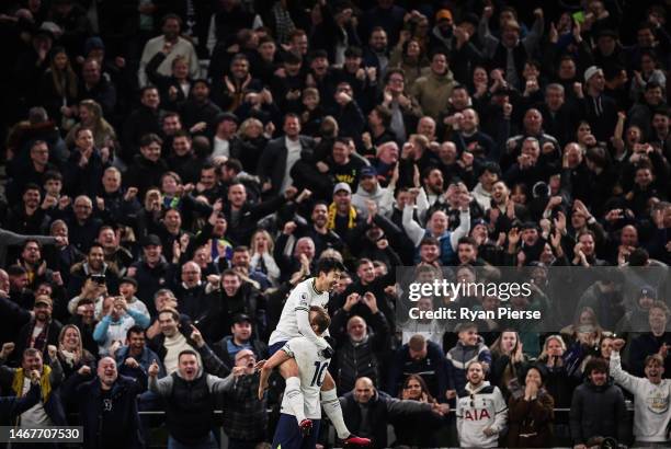 Son Heung-Min of Tottenham Hotspur celebrates after scoring the team's second goal with Harry Kane of Tottenham Hotspur during the Premier League...