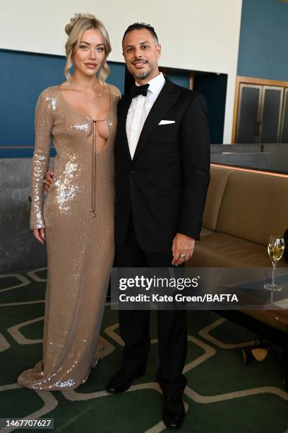 Jeffrey Hirsch and Laura Hamilton attend the EE BAFTA Film Awards 2023 at The Royal Festival Hall on February 19, 2023 in London, England.