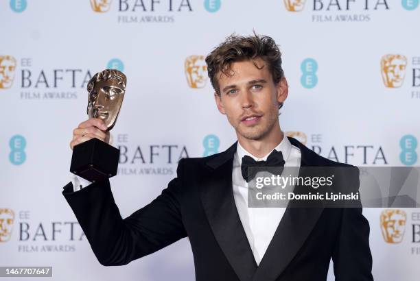 Austin Butler poses with the Leading Actor Award for his performance in 'Elvis' during the 2023 EE BAFTA Film Awards, held at the Royal Festival Hall...