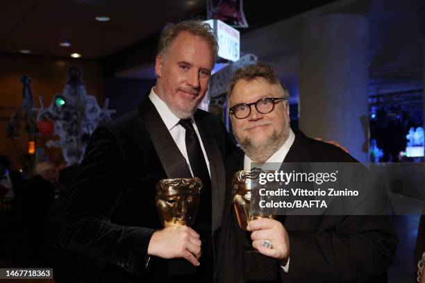 Producer Mark Gustafson and Director Guillermo del Toro pose with the Best Animated Film award during the EE BAFTA Film Awards 2023 Dinner at the...