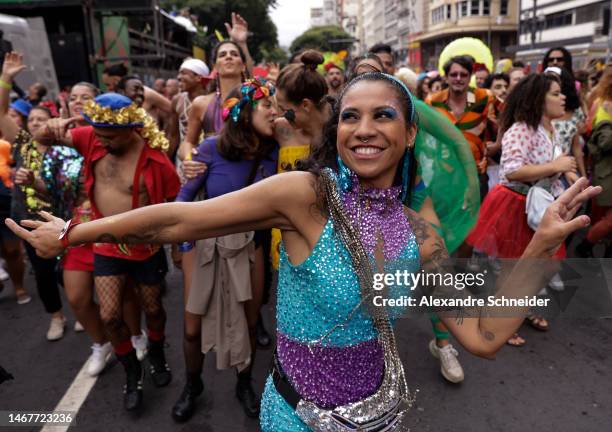 Reveller dances during the annual street block party know as "Explode Coracao" on the third day of Carnival on February 19, 2023 in Sao Paulo,...