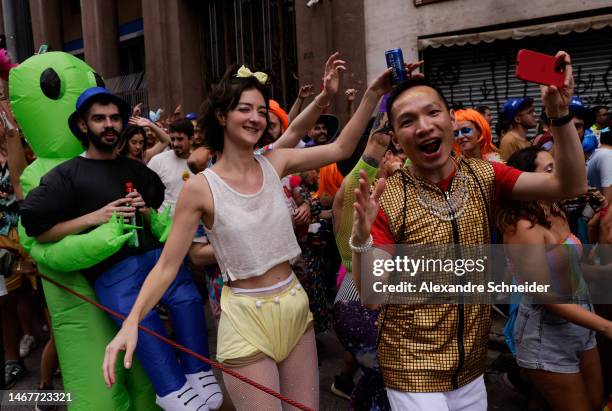 Revelers dance during the annual street block party know as "Explode Coracao" on the third day of Carnival on February 19, 2023 in Sao Paulo, Brazil....