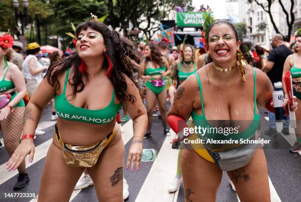 Revelers dance during the annual street block party know as "Explode Coracao" on the third day of Carnival on February 19, 2023 in Sao Paulo, Brazil....