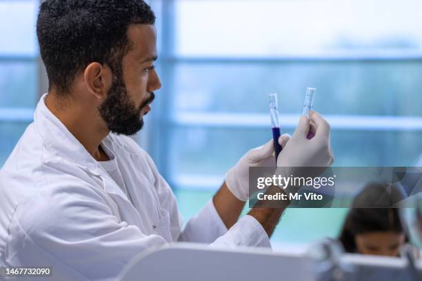 chemistry professor and students in the laboratory - white glove stock pictures, royalty-free photos & images