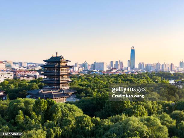 daming lake and jinan city skyline - jinan stock pictures, royalty-free photos & images