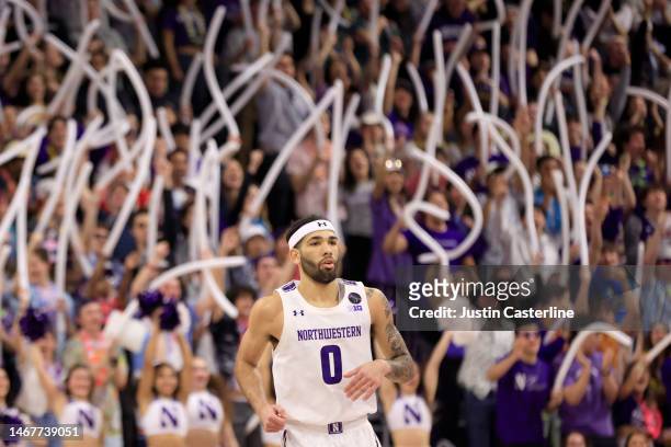 Boo Buie of the Northwestern Wildcats looks on during the first half in the game against the Iowa Hawkeyes at Welsh-Ryan Arena on February 19, 2023...