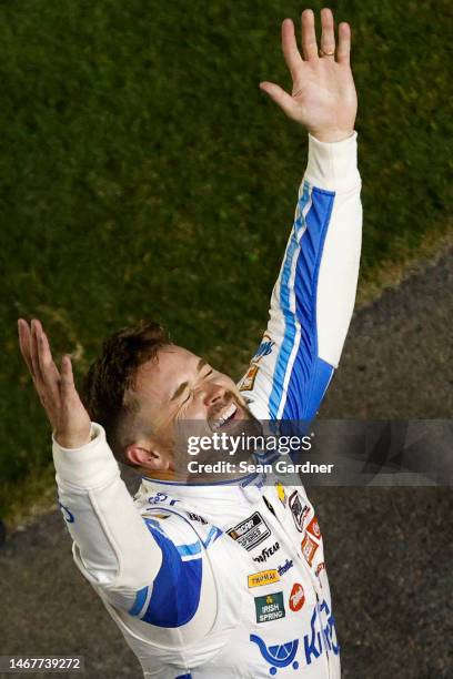 Ricky Stenhouse Jr., driver of the Kroger/Cottonelle Chevrolet, celebrates after winning the NASCAR Cup Series 65th Annual Daytona 500 at Daytona...