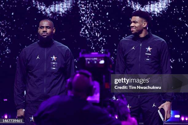 LeBron James of the Los Angeles Lakers, left, and Giannis Antetokounmpo of the Milwaukee Bucks look on prior to the 2023 NBA All Star Game between...