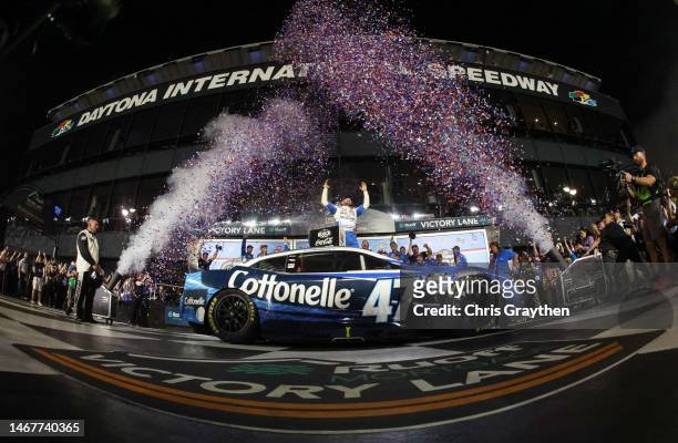 Ricky Stenhouse Jr., driver of the Kroger/Cottonelle Chevrolet, celebrates in victory lane after winning the NASCAR Cup Series 65th Annual Daytona...