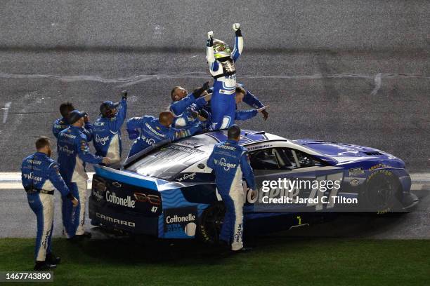 Ricky Stenhouse Jr., driver of the Kroger/Cottonelle Chevrolet, celebrates with his crew after winning the NASCAR Cup Series 65th Annual Daytona 500...