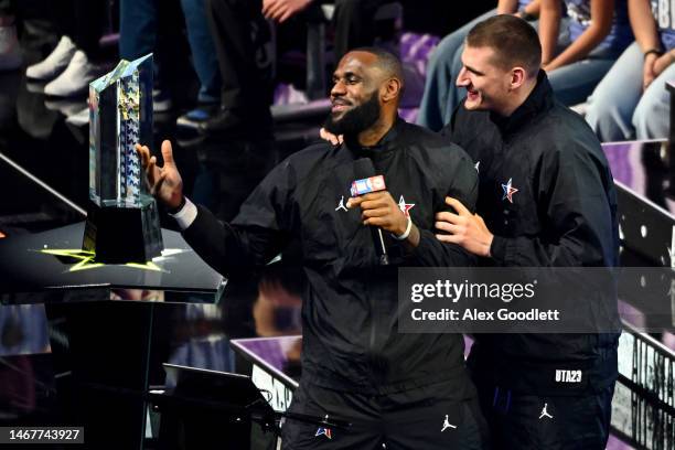 LeBron James of the Los Angeles Lakers and Nikola Jokic of the Denver Nuggets hug prior to the 2023 NBA All Star Game between Team Giannis and Team...