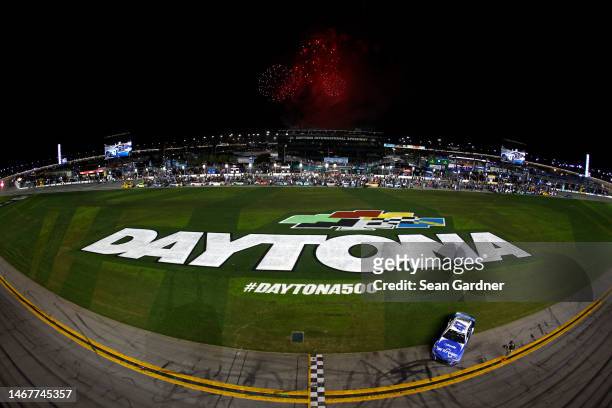Ricky Stenhouse Jr., driver of the Kroger/Cottonelle Chevrolet, celebrates with after winning the NASCAR Cup Series 65th Annual Daytona 500 at...