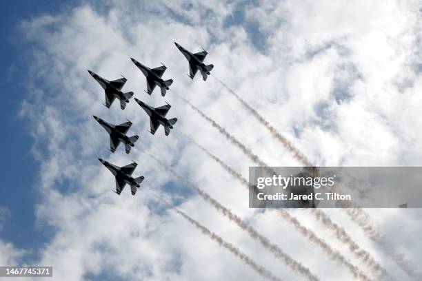 The U.S. Air Force Thunderbirds perform a flyover prior to the NASCAR Cup Series 65th Annual Daytona 500 at Daytona International Speedway on...