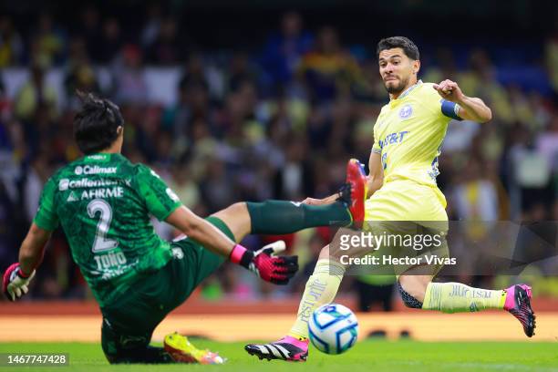 Henry Martin of America battles for possession with Jose Rodriguez of Tijuana during the 8th round match between Puebla and Cruz Azul as part of the...