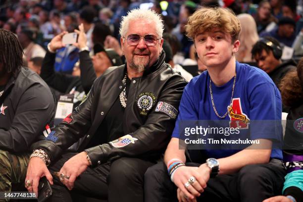 Television personality Guy Fieri poses with his son Ryder Fieri prior to the 2023 NBA All Star Game between Team Giannis and Team LeBron at Vivint...