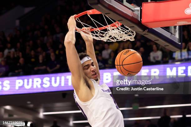 Tydus Verhoeven of the Northwestern Wildcats dunks the ball during the first half in the game against the Iowa Hawkeyes at Welsh-Ryan Arena on...
