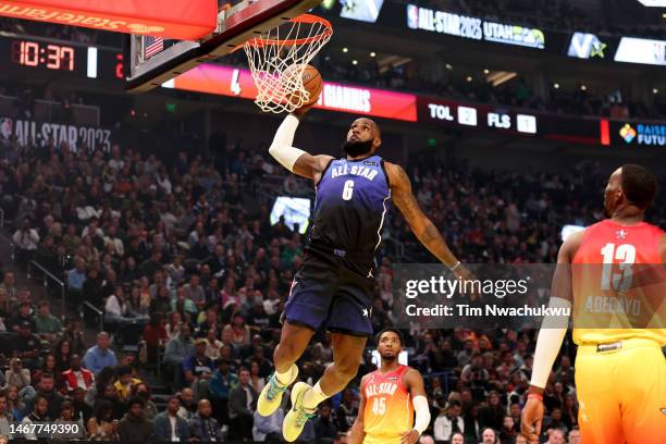 LeBron James of the Los Angeles Lakers dunks in the 2023 NBA All Star Game between Team Giannis and Team LeBron at Vivint Arena on February 19, 2023...