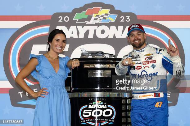 Ricky Stenhouse Jr., driver of the Kroger/Cottonelle Chevrolet, displays his Daytona 500 ring as he poses with wife, Madyson Joye Stenhouse in...