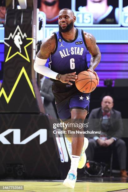 LeBron James of the Los Angeles Lakers brings the ball up court during the first quarter in the 2023 NBA All Star Game between Team Giannis and Team...