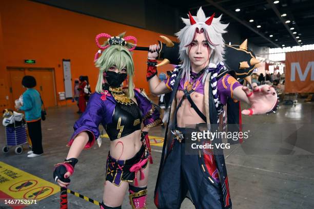 Cosplayers pose for a photo during COMICUP 2023SP, an animation-themed exhibition, at Guangzhou Pazhou International Convention and Exhibition Center...