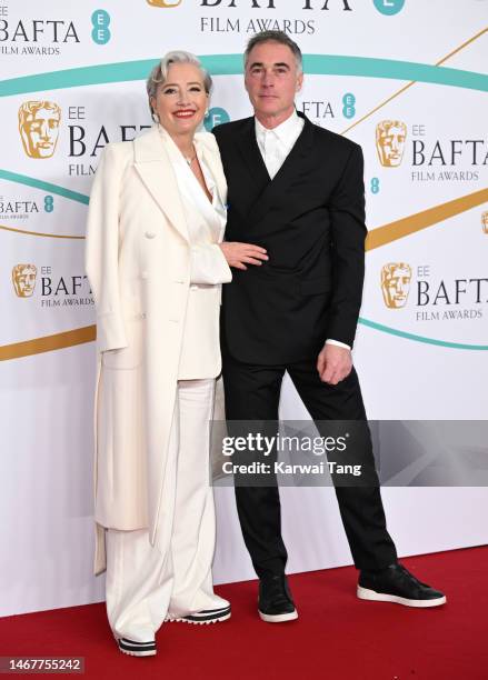Emma Thompson and Greg Wise attends the EE BAFTA Film Awards 2023 at The Royal Festival Hall on February 19, 2023 in London, England.