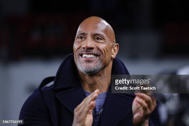 Owner Dwayne Johnson reacts on the sideline during the first half of the XFL game between the DC Defenders and the Seattle Sea Dragons at Audi Field...