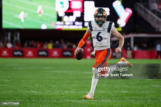 Ben DiNucci of the Seattle Sea Dragons carries the ball against the DC Defenders during the second half of the XFL game at Audi Field on February 19,...