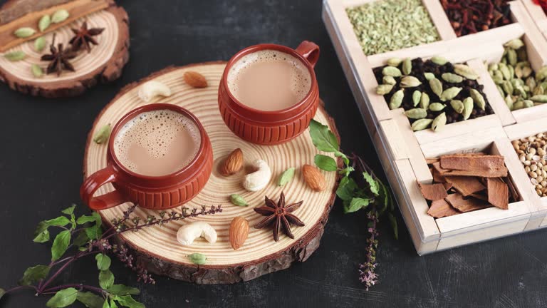 https://media.gettyimages.com/id/1467773810/video/indian-masala-chai-traditional-beverage-tea-with-milk-spices-kerala-india.jpg?b=1&s=640x640&k=20&c=9p8eise35FufRY7e5t7vFtIuVB2g8MEd3CKDDhgYtlM=