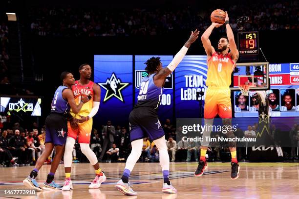 Jayson Tatum of the Boston Celtics shoots over Julius Randle of the New York Knicks in the 2023 NBA All Star Game between Team Giannis and Team...