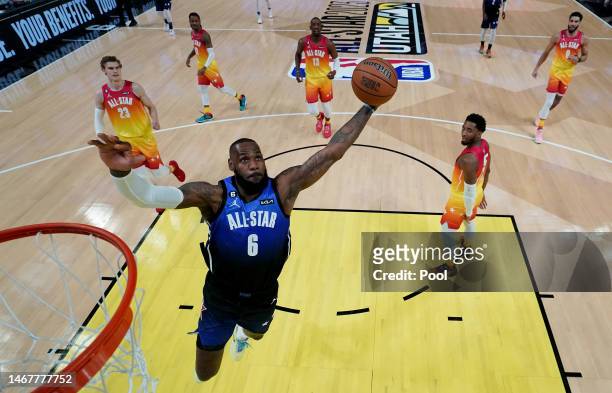 LeBron James of the Los Angeles Lakers dunks during the first quarter in the 2023 NBA All Star Game between Team Giannis and Team LeBron at Vivint...