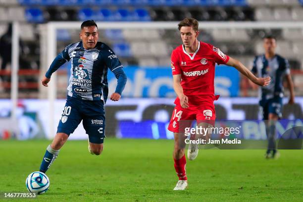 Erick Sanchez of Pachuca fights for the ball with Marcel Ruiz of Toluca during the 8th round match between Pachuca and Tijuana as part of the Torneo...